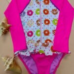 Entero infantil tipo buzo manga larga fucsia estampado