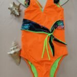 Entero juvenil con cinturón y faralado en hombros (Color 2)